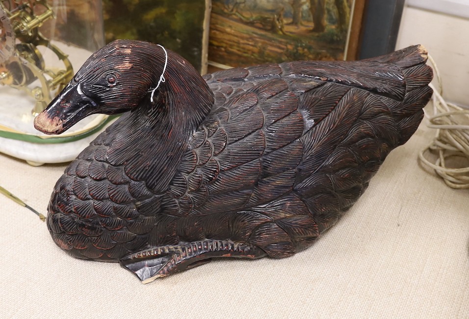 A large carved duck, 51 cms wide.